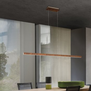 Slim LED pendant light above a modern dining table