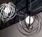 Preview: Pendant lamp in white or black rotating metal rings
