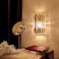 Preview: Schlafzimmer Wandlampe aus Kristall Facet neben dem Bett