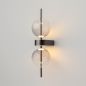 Preview: Design wall light, black, with two glass globes, warm white glow, side view