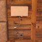 Preview: Braune Wandlampe mit LED Lesearm neben dem Bett