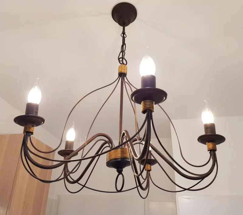 Chandelier frame made of modelled handcrafted metal