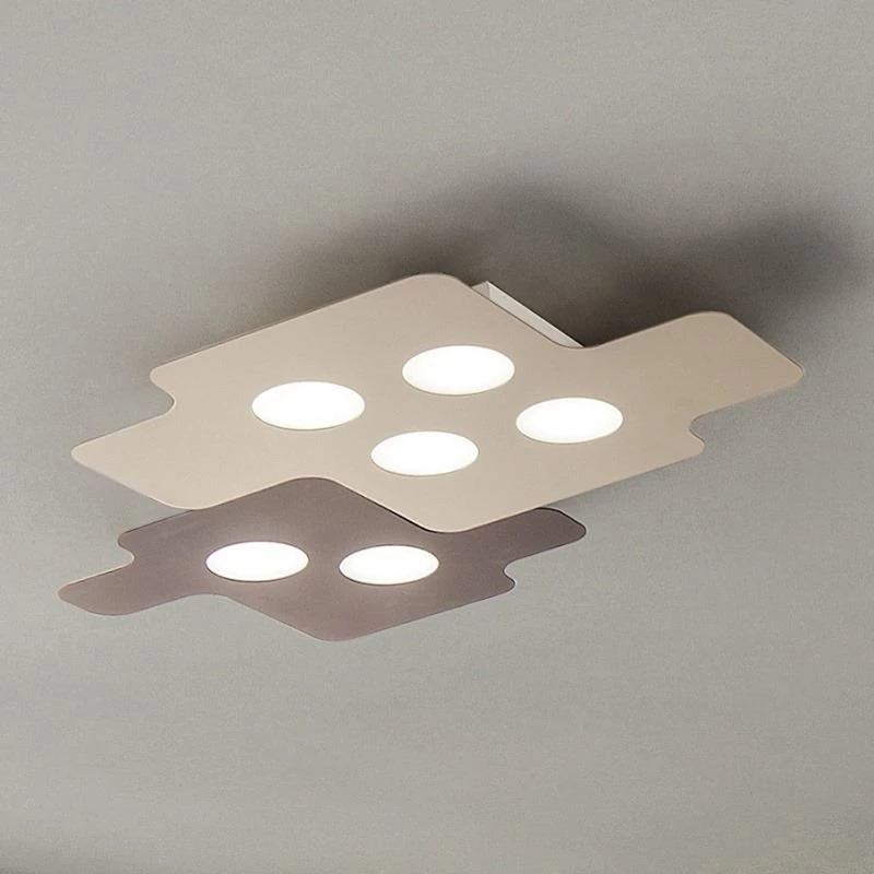 Two Puzzle LED lamps on the ceiling in dove gray and dark brown