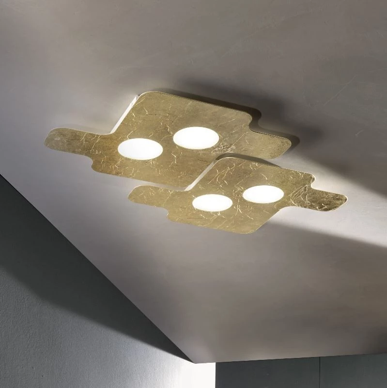Two Puzzle LED lamps for ceiling in gold leaf