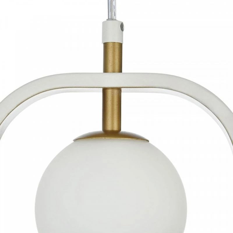 Pendant luminaire with white glass ball