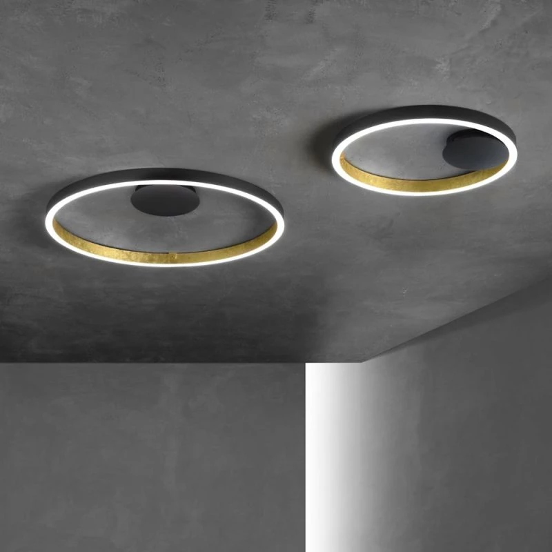 Ring ceiling light Loop 75cm and 50cm: black outside, gold leaf inside, mounting concrete ceiling