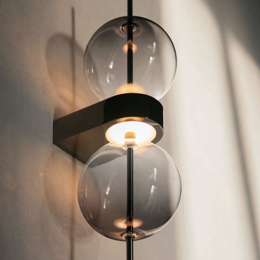 Elegant wall light with 2 grey glass spheres and soft light