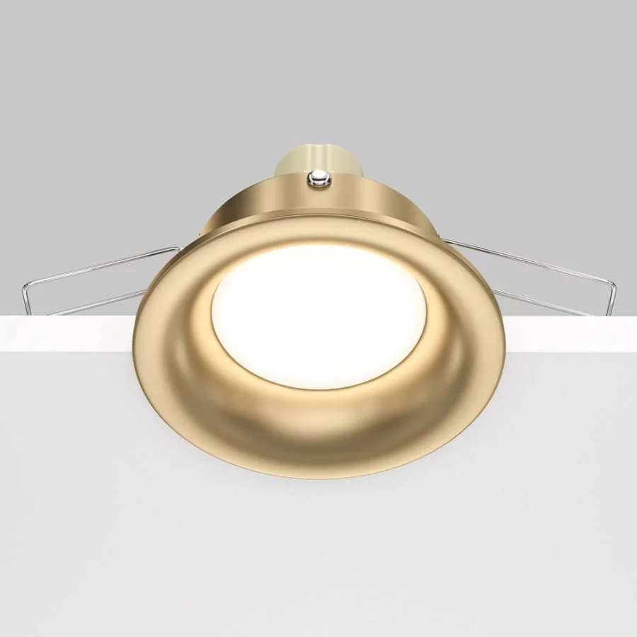Golden recessed spotlight for ceiling installation Golden recessed spotlight for ceiling installation