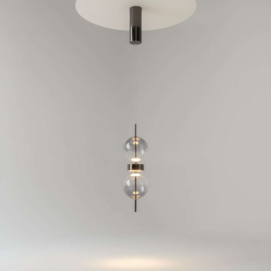 Black pendant lamp with 2 glass balls hanging on a thin steel cable