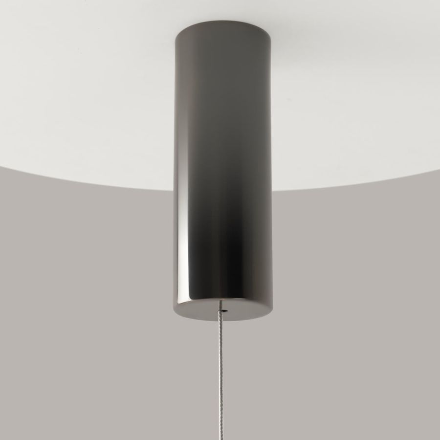 Close-up of the black cylindrical ceiling canopy