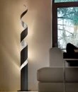 Living room floor lamp Truciolo in iron gray and silver leaf