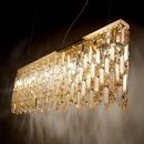 Elisir pendant lamp in gold with amber yellow crystals