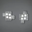 Two Puzzle LED lamps on the wall in silver leaf