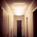 Illuminate long narrow room or hallway with sailcloth.